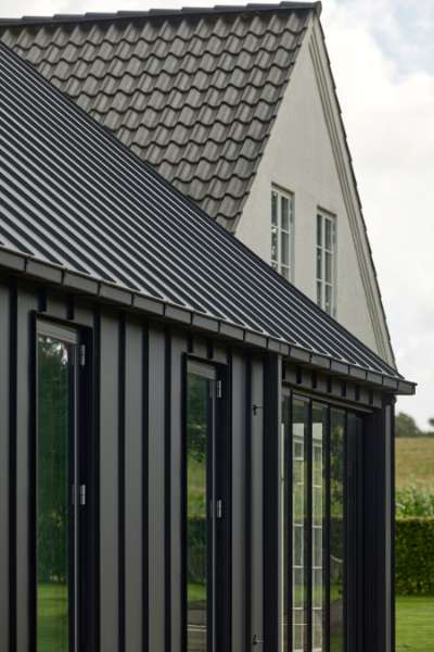 Steel roof and facade set the stage for Danish countryside charm, Bøelvej 13, 6880 Tarm, Denmark